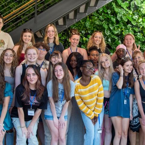 A group of high school students poses for a photo